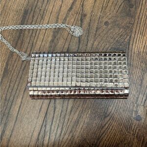 Studded gem clutch